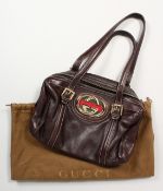 A GUCCI SOFT BROWN LEATHER HANDBAG. No. 17009 204990, in a dust bag.