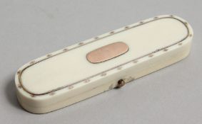 A GEORGIAN IVORY AND GOLD TOOTHPICK CASE, the inside with a mirror. 3.25ins long.