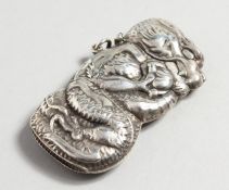 A SILVER DRAGON VESTA.
