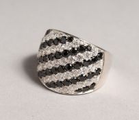 A SILVER, SAPPHIRE, AND CZ RING.