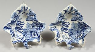 A PAIR OF STAFFORDSHIRE BLUE AND WHITE LEAF SHAPED PICKLE DISHES 5ins.