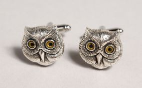 A PAIR OF SILVER OWL CUFFLINKS.