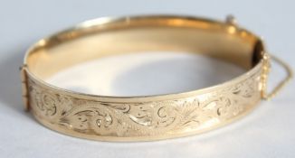 A 9CT GOLD AND EMERALD BRACELET. J.E.E.S. 29gms.