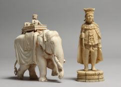 TWO EUROPEAN CARVED IVORY CHESS PIECES, king and rook. King stands 10.5cms tall (2). (AF).