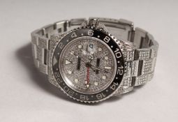 A SUPERB ROLEX GMT MASTER II, with diamond face, enamel numbers and diamond set bracelet, in a Rolex