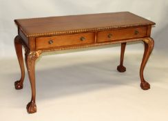 A GOOD CHIPPENDALE DESIGN MAHOGANY LONG SERVING TABLE with carved gadrooned edge, two frieze