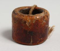 A HORN / AMBER ARCHERS RING.