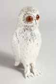 A SILVER PLATE OWL SUGAR CASTER. 6ins high.