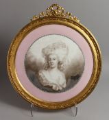 A GOOD LOUIS XVI STYLE CIRCULAR PORCELAIN PORTRAIT PLAQUE of a lady, head and shoulders. 15ins