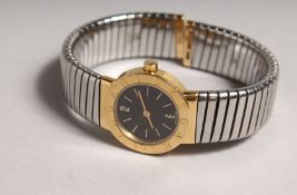 AN 18CT GOLD BULGARI WRISTWATCH with flexible strap, No. P73245, in a box.