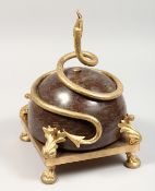 A GILT BRONZE AND MARBLE CENTREPIECE with a curling snake, on a square base with four claw and