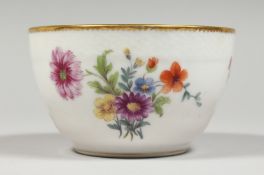 A COPENHAGEN CIRCULALR SUGAR BOWL, painted with flowers. 4insdiameter