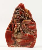 A CHINESE CARVED HARDSTONE BOULDER. 9ins high.