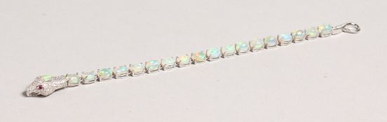 A SILVER OPAL SET SNAKE LINE BRACELET.