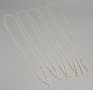 FIVE STRINGS OF SEED PEARLS