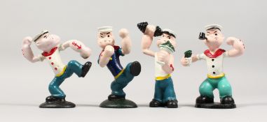 FOUR PAINTED CAST IRON POPEYE FIGURES. 5.5ins high.