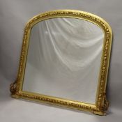 A GOOD GILTWOOD OVERMANTLE MIRROR with domed top. 4ft x 3ft 9ins wide.