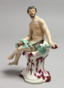 AN 18TH CENTURY VIENNA FIGURE of a scantily dressed man seated on a pierced base holding leaves.