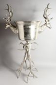 A CHAMPAGNE STAND with deer's head and antlers. 3ft 5ins high.