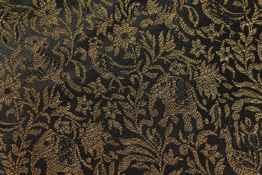 A BLACK AND GOLD DAMASK RUNNER. 13ft 2ins x 3ft.