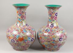 A GOOD PAIR OF CHINESE PORCELAIN MILLEFIORI BULBOUS VASES. 22ins high.