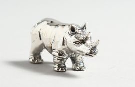 A CAST SILVER RHINO.