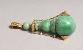 A SUPERB GOLD MOUNTED JADE PERFUME BOTTLE with gold chain, seed pearls, gold stopper and pendant.