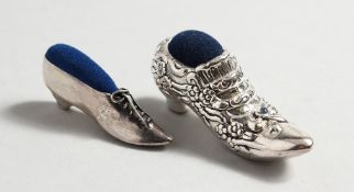 TWO SILVER SHOE PINCUSHIONS.