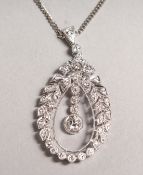 A VERY GOOD 18CT WHITE GOLD DIAMOND WREATH PENDANT on chain.