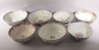 SEVEN LARGE CHINESE PORCELAIN BOWLS, various styles, six painted with native flora, one painted with