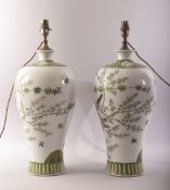A GOOD PAIR OF CHINESE FAMILLE VERTE PORCELAIN VASE LAMPS, undrilled, painted with birds amongst