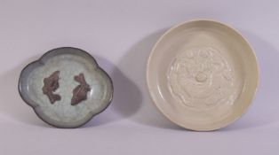 A CHINESE GE WARE TWIN FISH QUATREFOIL DISH, together with a pale green dragon brush washer, dish