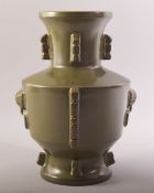 A GOOD LARGE CHINESE TEA DUST GLAZE VASE, with two lion shaped ring handles, six character mark to