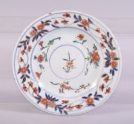 A JAPANESE IMARI PORCELAIN STAND, painted in the imari palette with foliate decoration, supported on