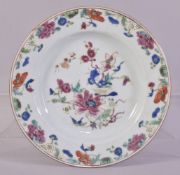 A CHINESE FAMILLE ROSE PORCELAIN PLATE, the centre with floral spray, the border painted with