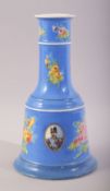 A PERSIAN QAJAR PORCELAIN HUQQA BASE, the base with three oval portraits, 23.5cm high.