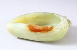 A CHINESE CARVED JADE BRUSH WASHER, in the form of a leaf, 14cm wide.