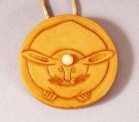 A JAPANESE MEIJI PERIOD CARVED IVORY KAGIMIBUTA NETSUKE OF A RABBIT / HARE - the netsuke carved with