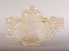 A CHINESE CARVED / MOULDED GLASS TEAPOT & COVER - decorated with dragons and chilong - 14cm