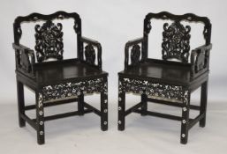 A GOOD PAIR OF CHINESE CARVED HARDWOOD CHAIRS, inlaid with mother of pearl
