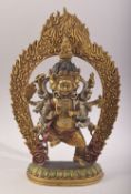 A TIBETAN GILT BRONZE FIGURE OF MULTI ARM BUDDHA- with poly chrome decorations, 32cm