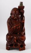 A CHINESE CARVED HARDWOOD FIGURE OF SHOU LAO - as a lamp - 42cm
