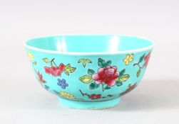 A CHINESE TURQUOISE GLAZED PORCELAIN BOWL - the turquoise ground with floral famille rose