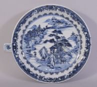 A CHINESE BLUE AND WHITE PORCELAIN WARMING DISH, painted with a landscape scene, 23.5cm.