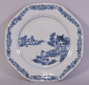 A CHINESE BLUE AND WHITE PORCELAIN DISH, painted with a scene with dogs and buildings, 22cm