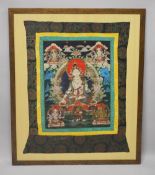 A GOOD LARGE 20TH CENTURY TIBETAN THANKA, mounted and framed, 120cm x 100cm.