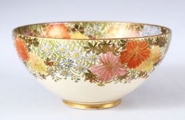 A GOOD JAPANESE SATSUMA BOWL, the bowl decorated with a band of flora with gilt highlights, the base