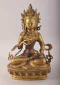 A THAI GILT BRONZE MODEL OF A DEITY, 21cm high.