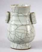 A CHINESE GE STYLE TWIN HANDLE CRACKLE GLAZE VASE, 18.5cm high.