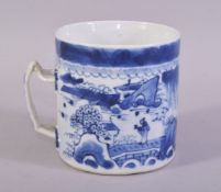 A CHINESE BLUE AND WHITE PORCELAIN MUG / TANKARD, painted with a landscape with a temple, trees